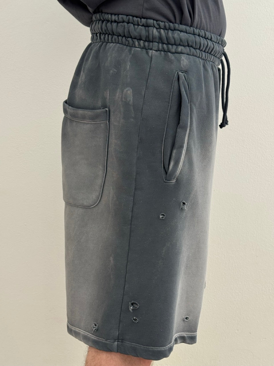 Ripped bermuda shorts