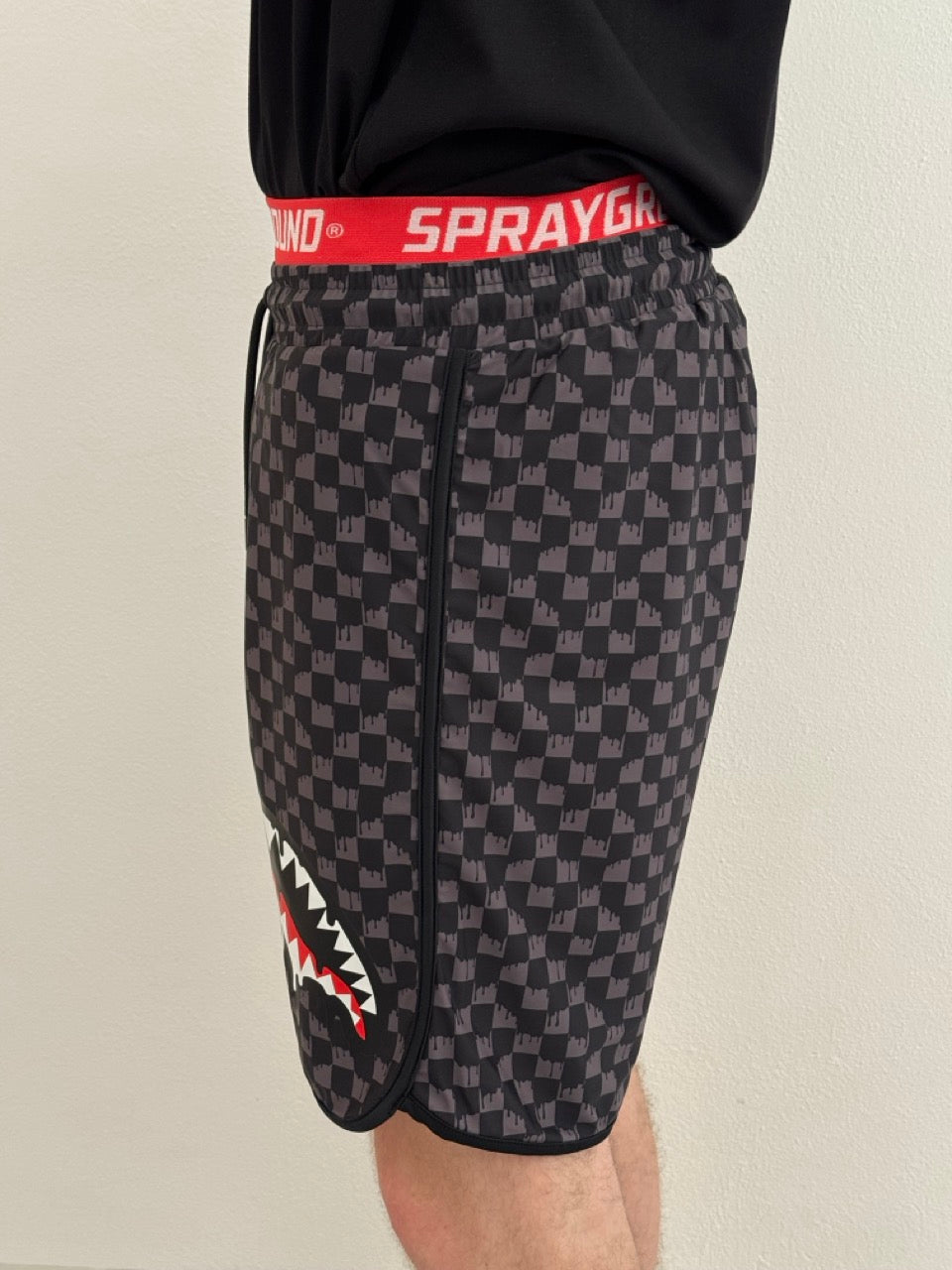 Drip checkered swim trunks