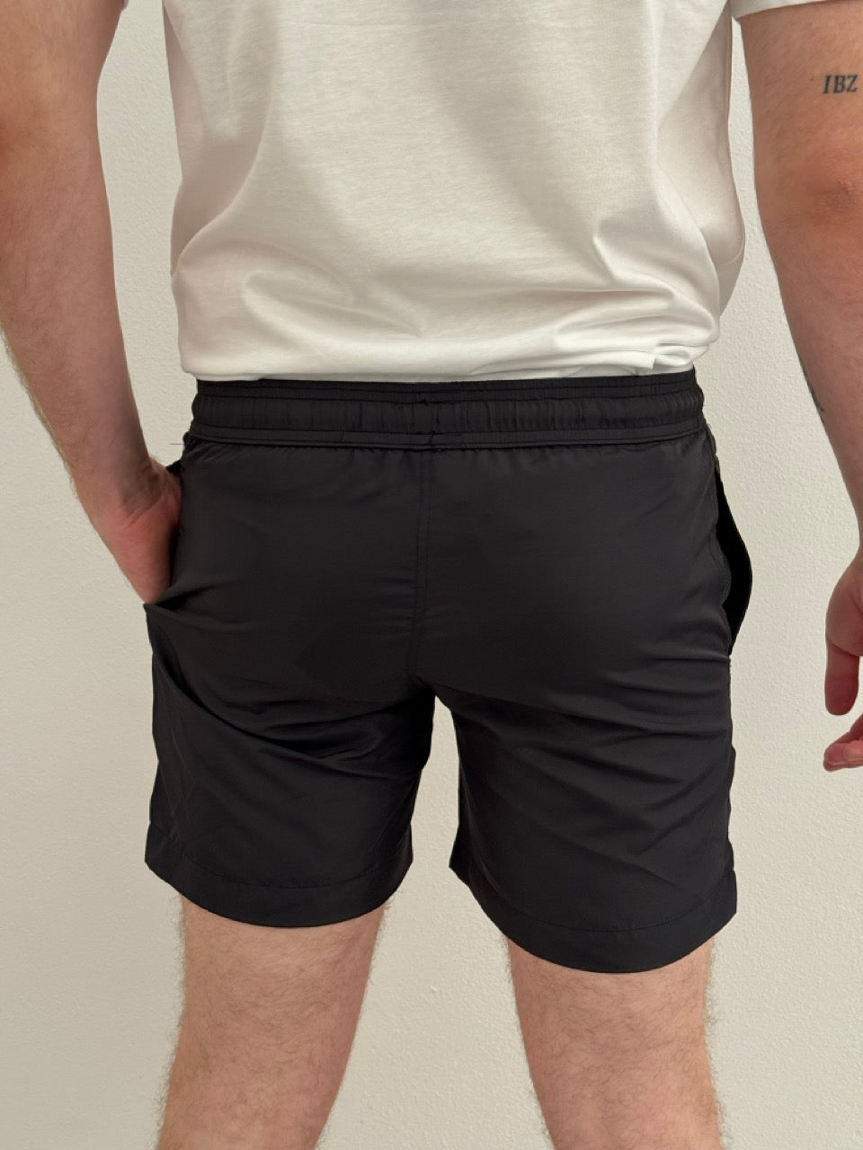 Swimming shorts logo