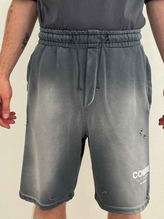 Ripped bermuda shorts