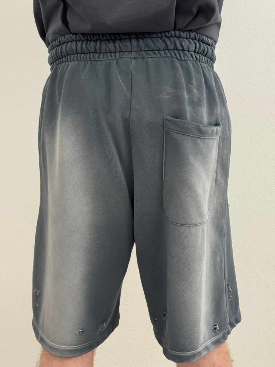 Ripped bermuda shorts