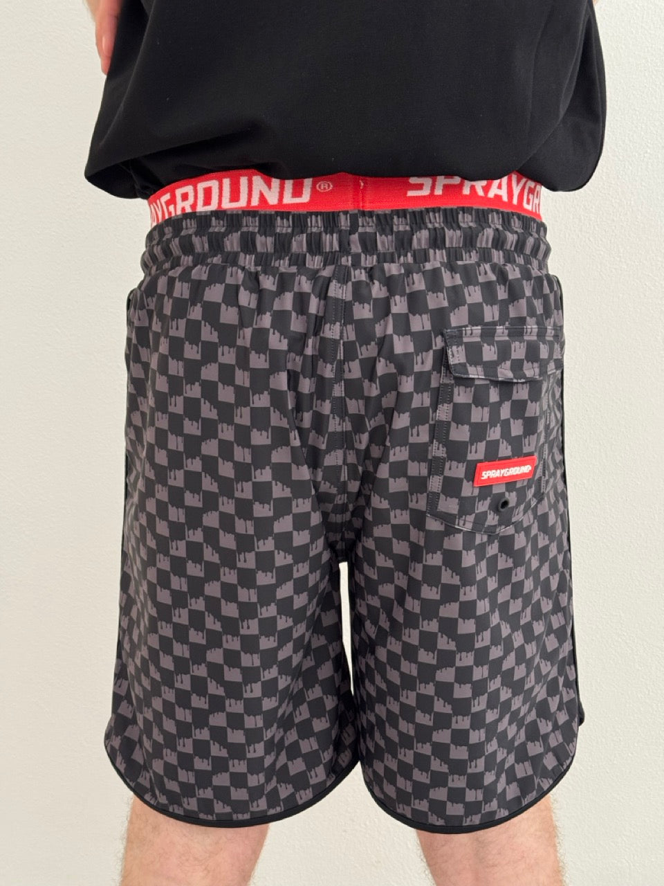 Drip checkered swim trunks