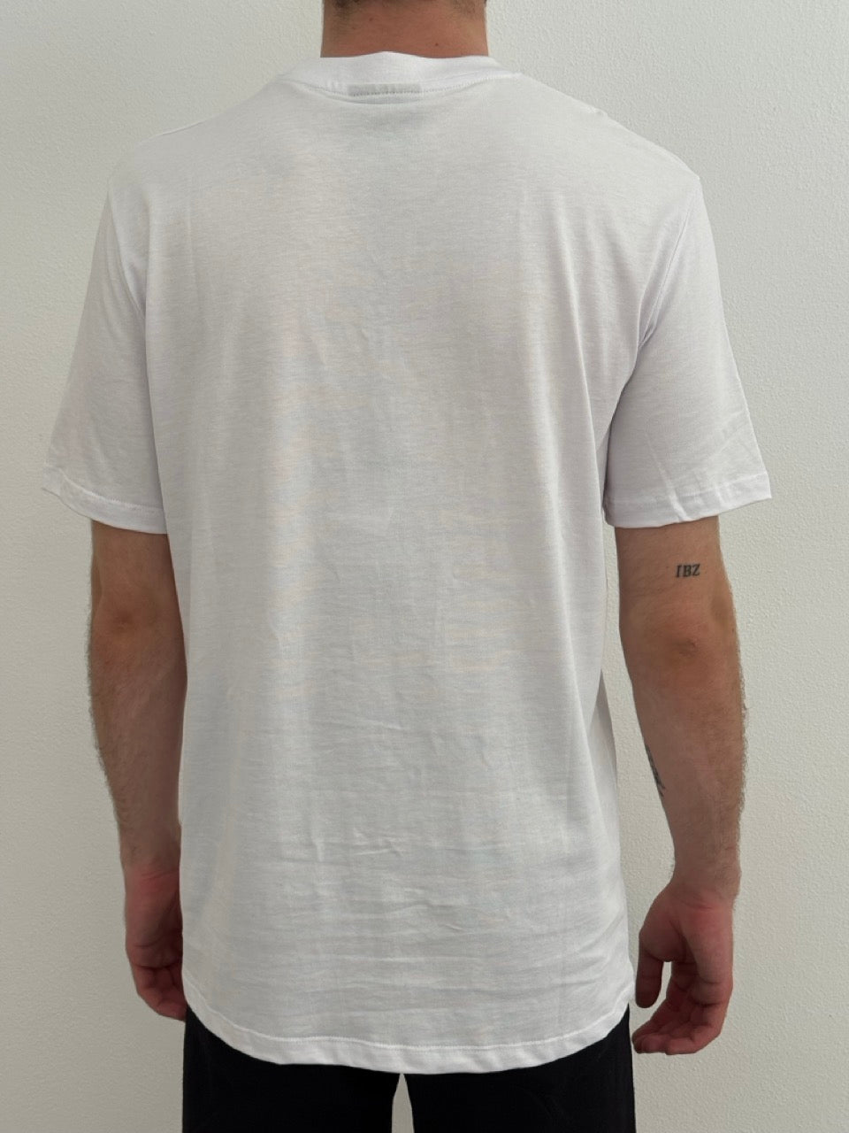 T-shirt in jersey girocollo con etichetta